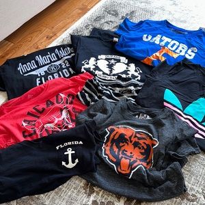 T-shirts - various sizes, but mostly for a small or medium size type.